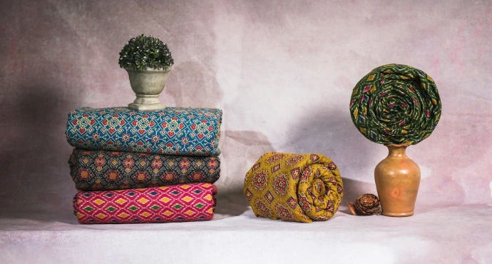 a group of colorful pots